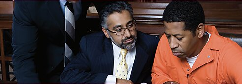 A lawyer consults with a client