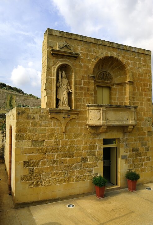 open door brown brick building