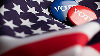 "Vote" buttons on an American flag